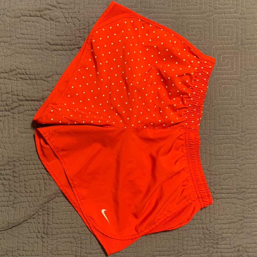Girls red Nike Dri fit running shorts